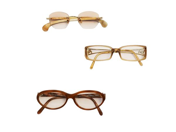 Three pairs of glasses with graduated lenses