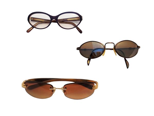Three pairs of glasses with graduated lenses
