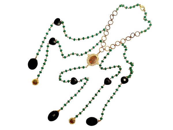 Lunga collana votiva