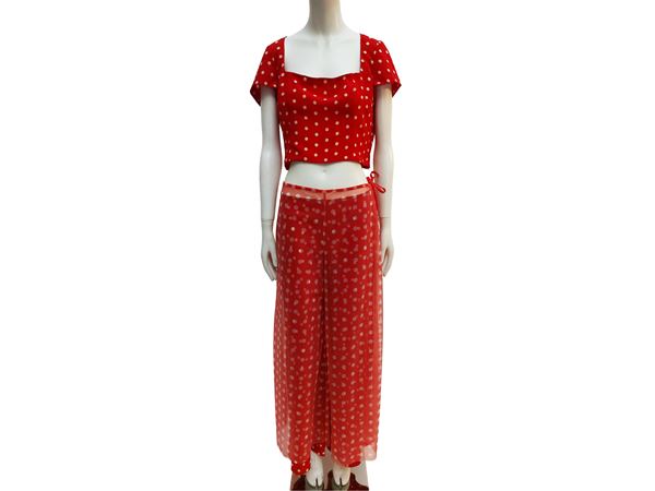 Red tailored suit with white polka dots