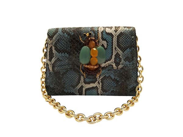 Jewel bag in python effect eco-leather