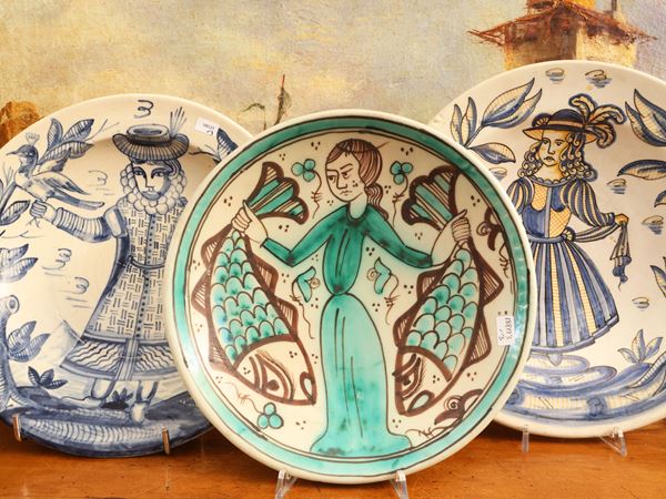 Three decorative plates in glazed terracotta