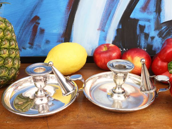 Pair of silver metal lies