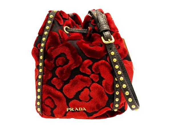 Prada - Small bucket bag in red and black devoré velvet