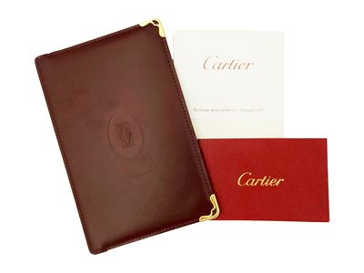 Cartier, Sognapunti in pelle bordeaux con finiture in ottone dorato