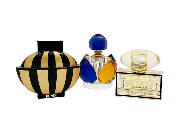 Two Fendi perfumes and one bottle