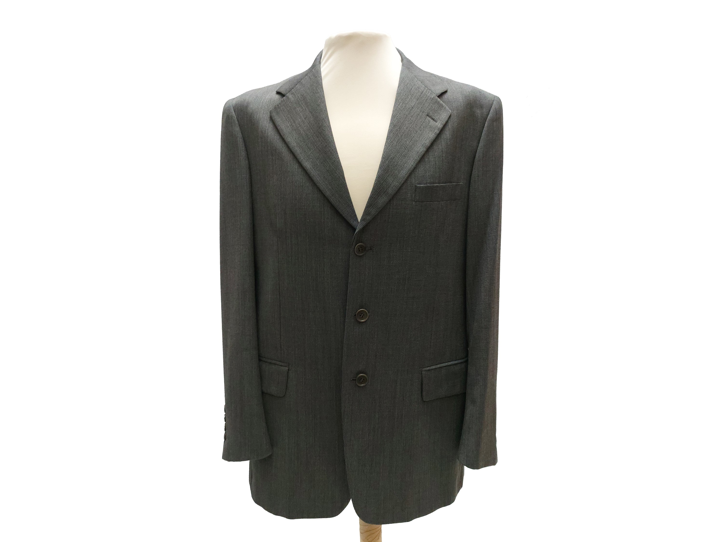 Story Uomo, Completo da uomo in lana “sale e pepe” in tessuto Ermenegildo Zegna, monopetto a tre ...