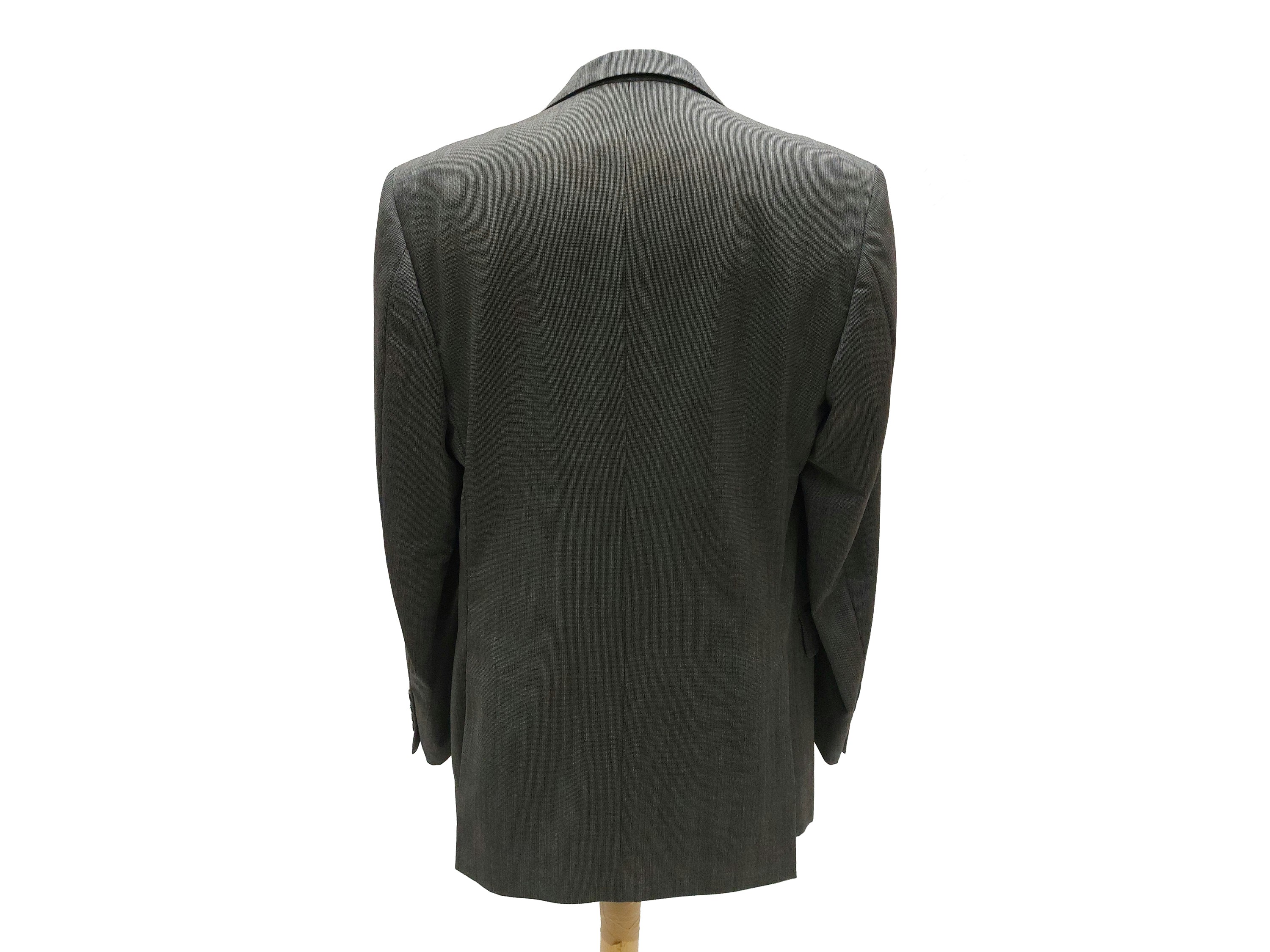 Story Uomo, Completo da uomo in lana “sale e pepe” in tessuto Ermenegildo Zegna, monopetto a tre ...