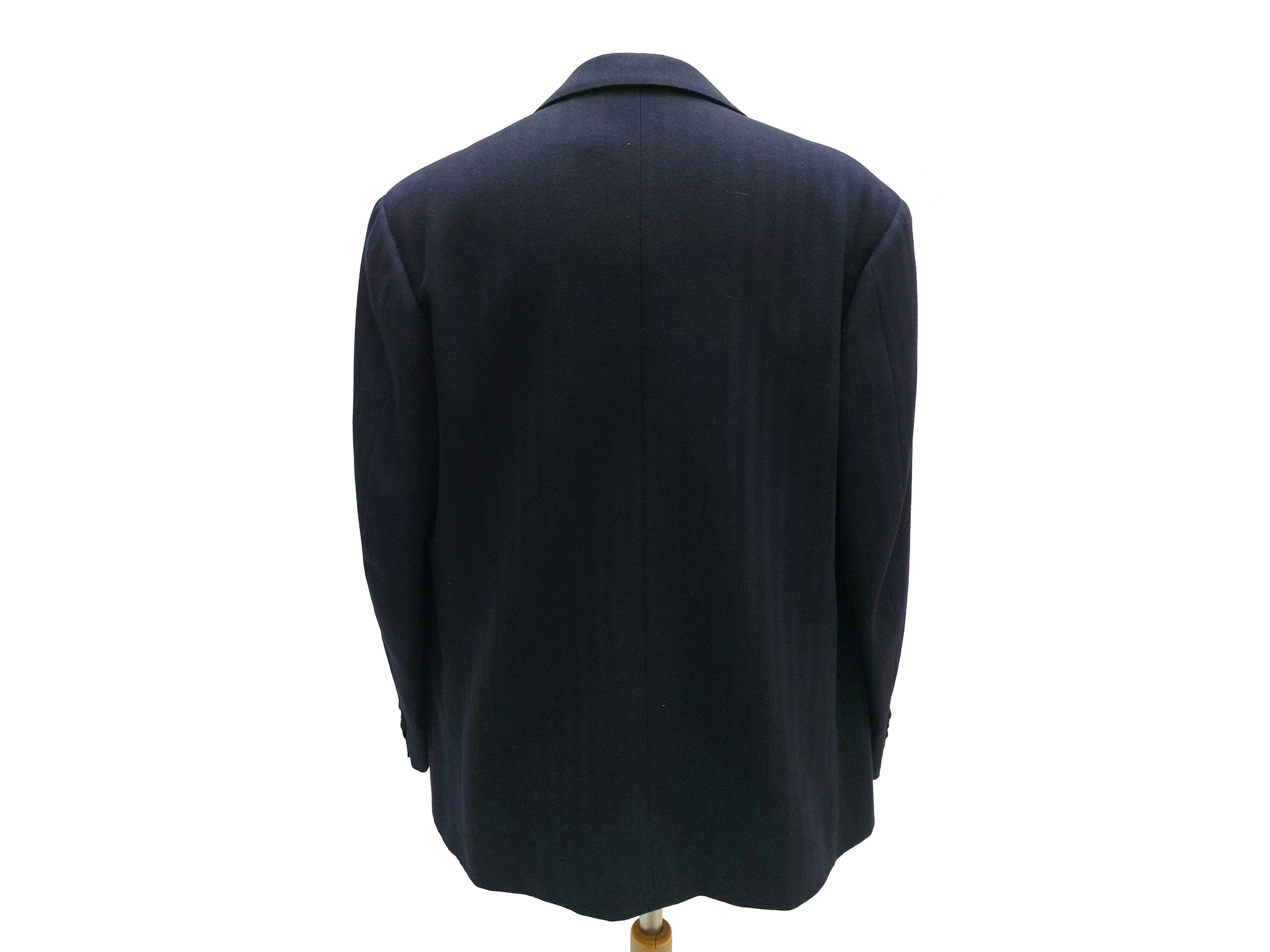 Giacca sartoriale da uomo spigata blu, monopetto a tre bottoni, abbinata a Cravatta Trussardi in ...