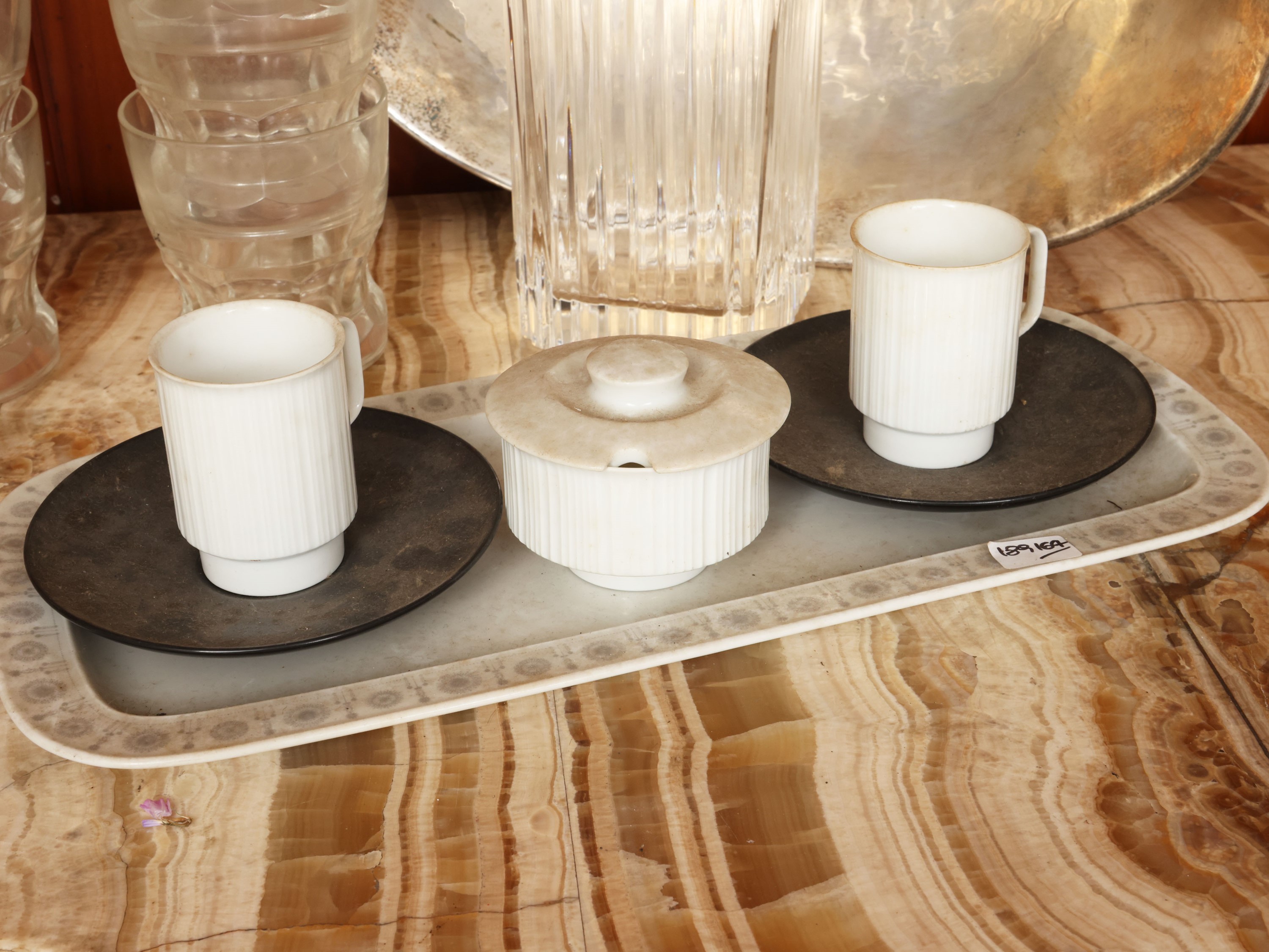 Accessori per la tavola di gusto moderno, porcellana Rosenthal, cristallo, metallo argentato e se...
