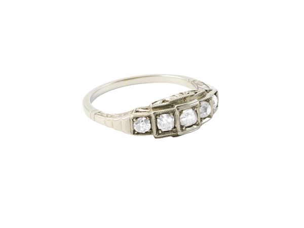 Anello in oro bianco 14Kt e diamanti