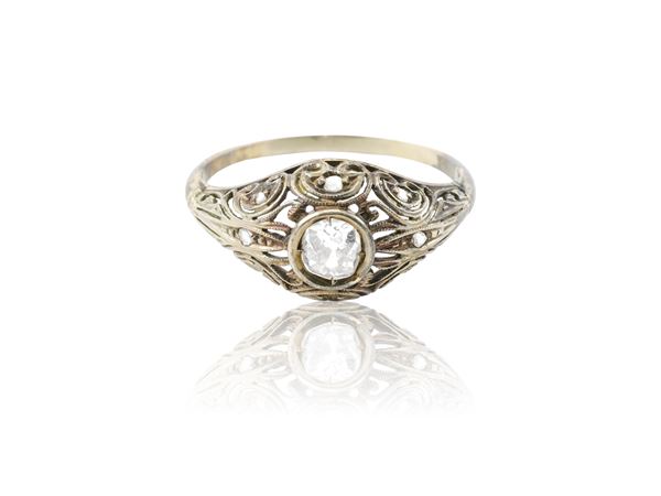 A 18K white gold and diamond ring