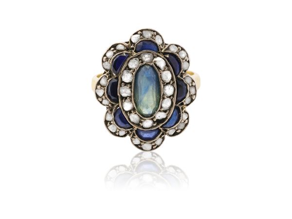 A sapphires and diamond roses ring in 18K yellow gold and silver
