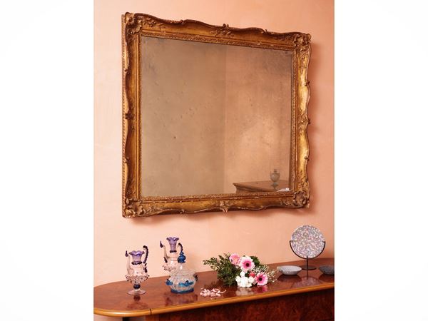 Mirror with wooden frame and golden tablet