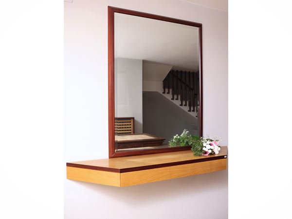 Suspended console with mirror