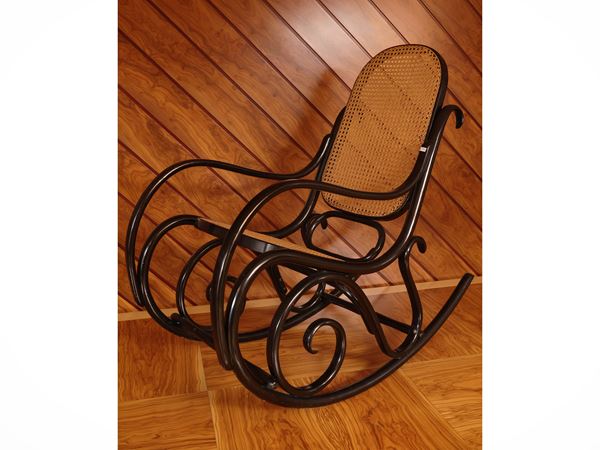 Rocking armchair in ebonized bent beech