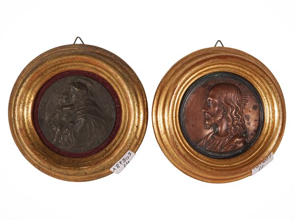 Two bas-reliefs and two metal medals depicting religious subjects