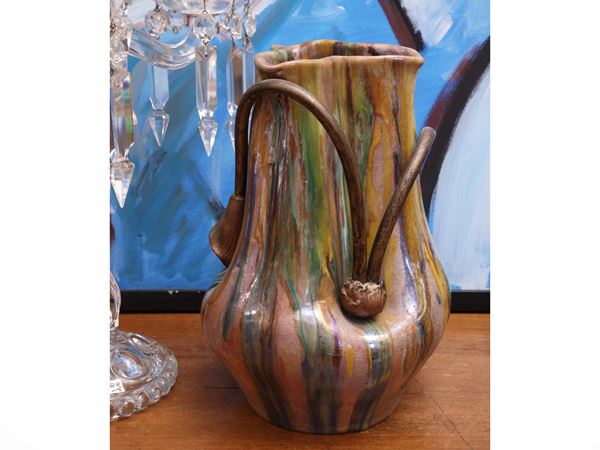 Terracotta vase decorated with casting