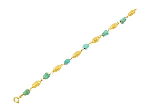 A 18k yellow gold and turquoise bracelet  - Auction Jewels and Watches - Maison Bibelot - Casa d'Aste Firenze - Milano