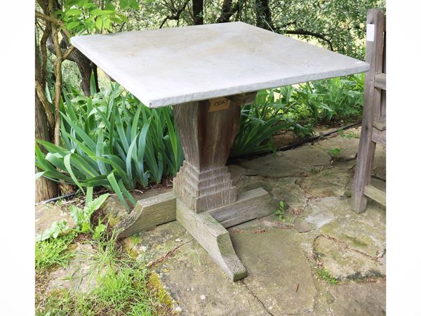 Garden table with pietra serena top