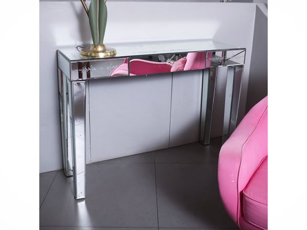 Console covered in mirror