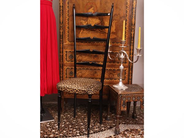 Pair of ebonized wooden chairs