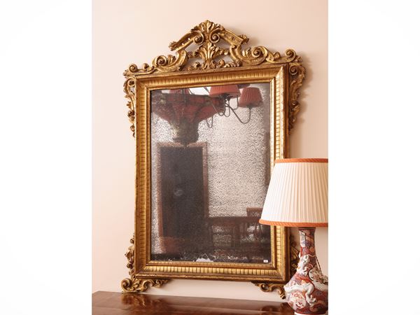 Mirror with carved and gilded wooden frame