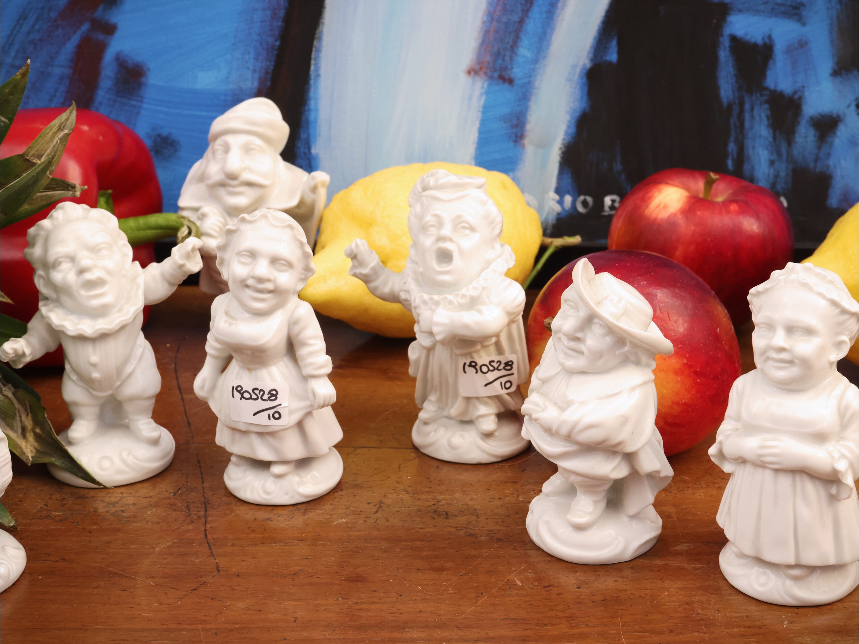 Caramogi e Ginori Capodimonte, Serie di dieci figure caricaturali in porcellana