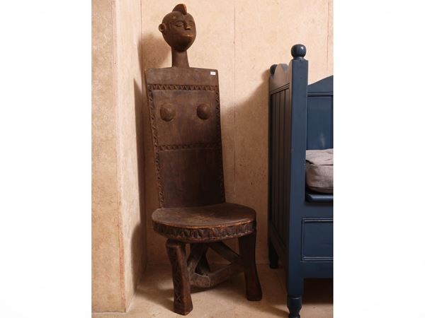 Scranno tribale antropomorfo in legno esotico