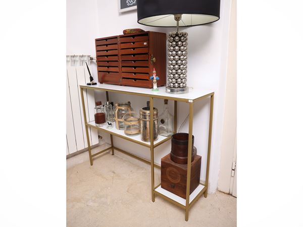 Etagere in metallo golden tone e vetro bianco