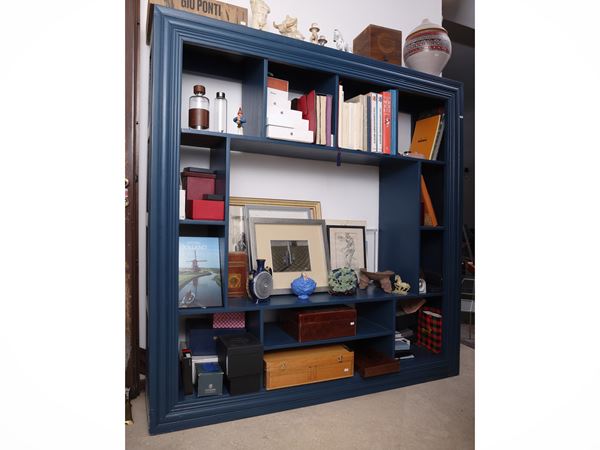 Open bookcase in whale blue stained wood