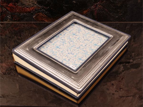 Album per fotografie con dettaglio in argento
