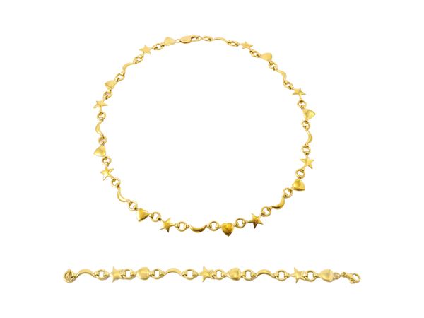 Demi parure in oro giallo 18kt