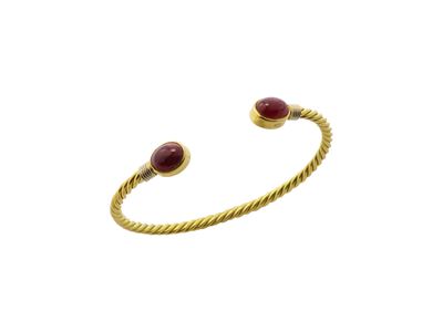 Bracciale a polsino in oro giallo 18 kt, cordonetto con granati cabochon ovali