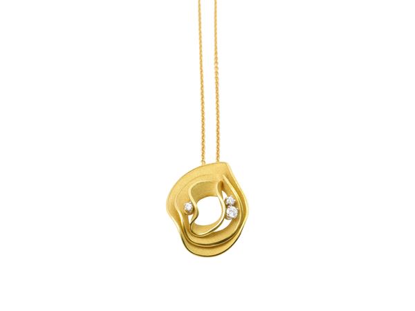 Cammilli, pendente  in oro yellow sunrise 18Kt e diamanti