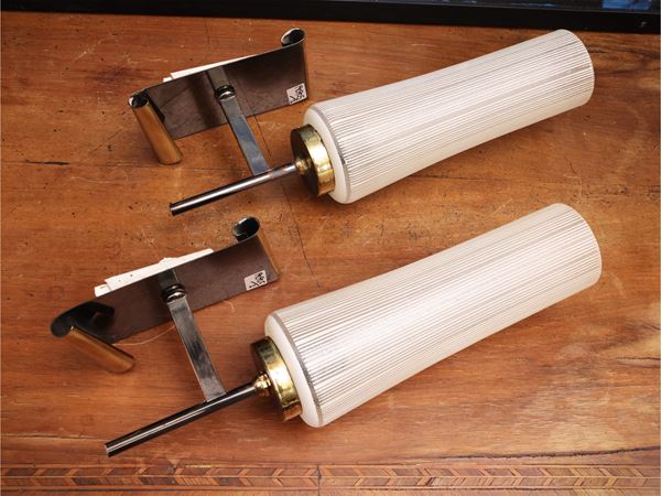 Pair of gilded metal and glass wall lights