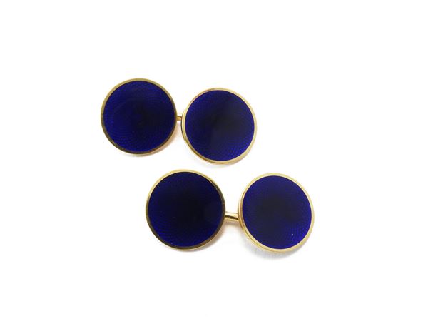 A 18K yellow gold cufflinks with blue enamel