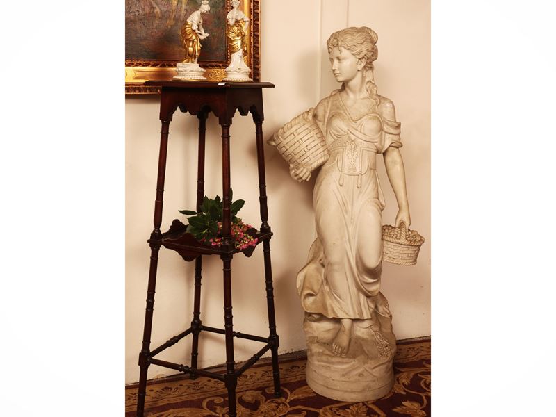 Scultura in materiale composito, Donna con cesti
