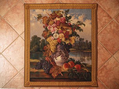Arazzetto decorativo in stile fiammingo, trionfo di fiori entro paesaggio