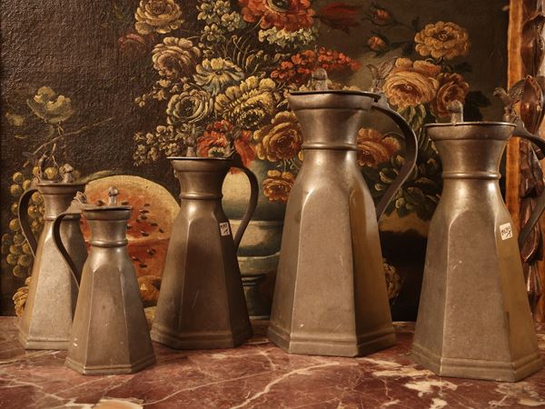 Series of five vintage pewter pourers
