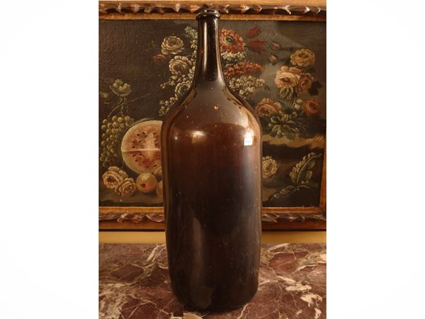 Large amber glass bottle