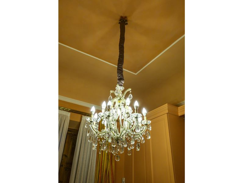 Lampadario, cristallo e otto bracci portacandele