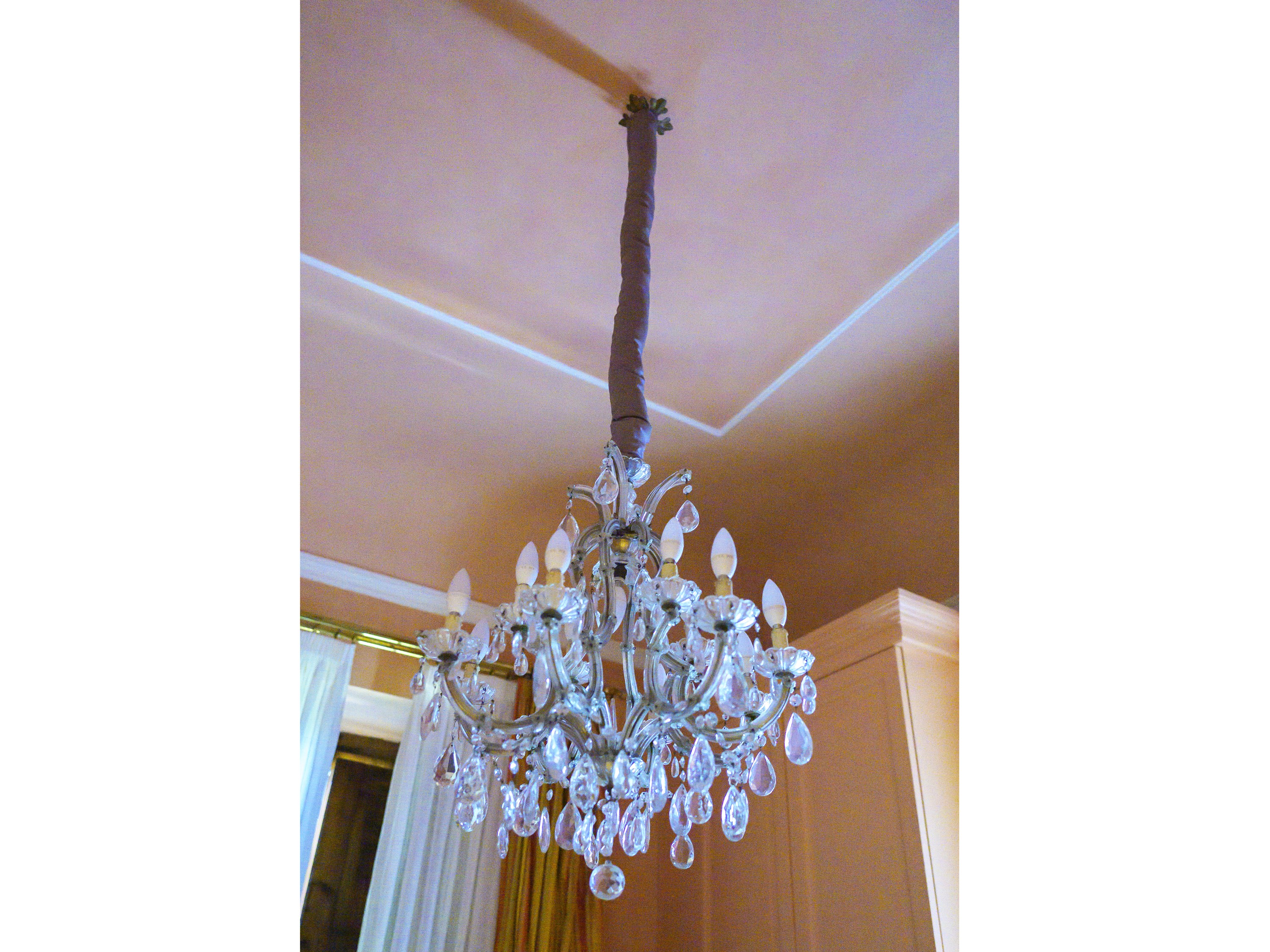 Lampadario, cristallo e otto bracci portacandele