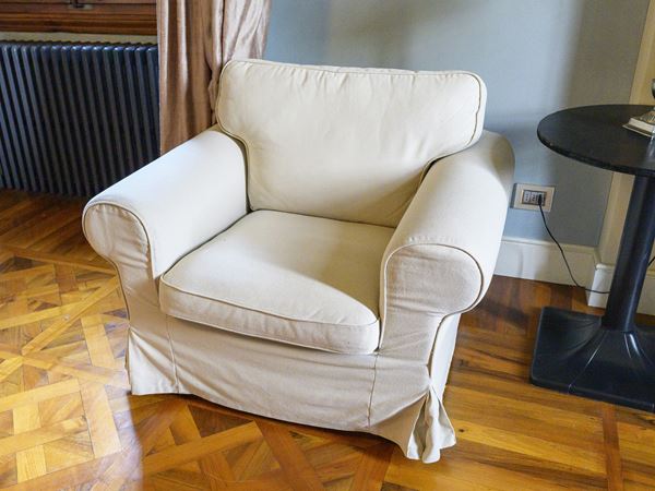 Padded armchair