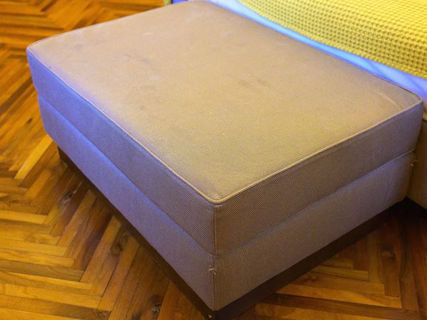 Storage pouf in gray fabric