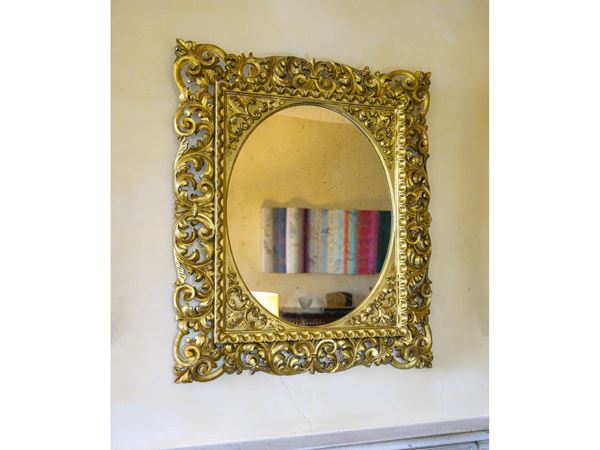 Carved and gilded wooden frame