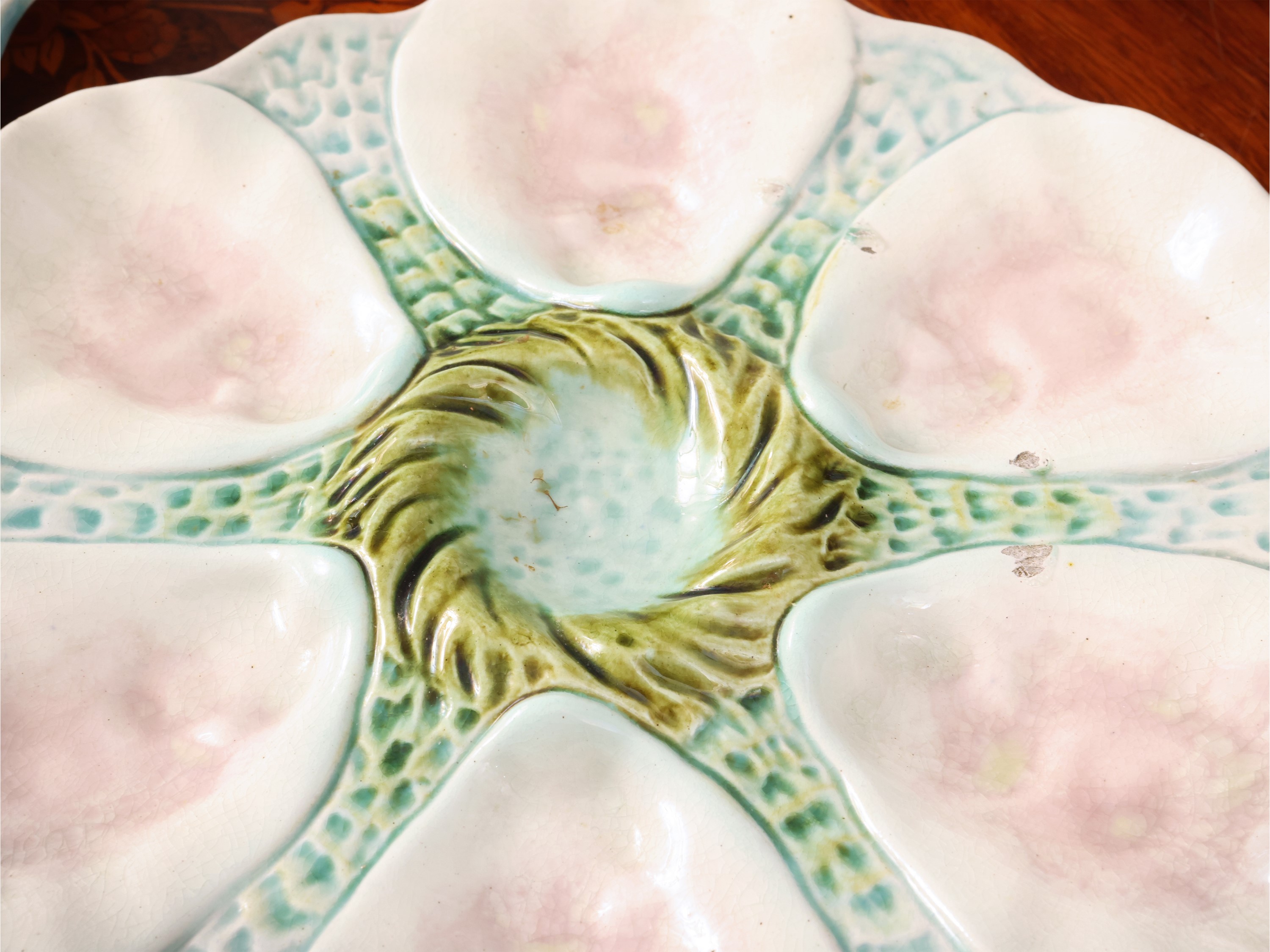 Francia, Serie di quattro piatti da ostriche in maiolica (inizio XX secolo)
