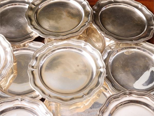 Series of twelve silver saucers