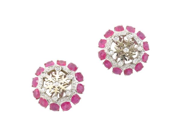 A diamonds and rubies earrings in 18K white gold