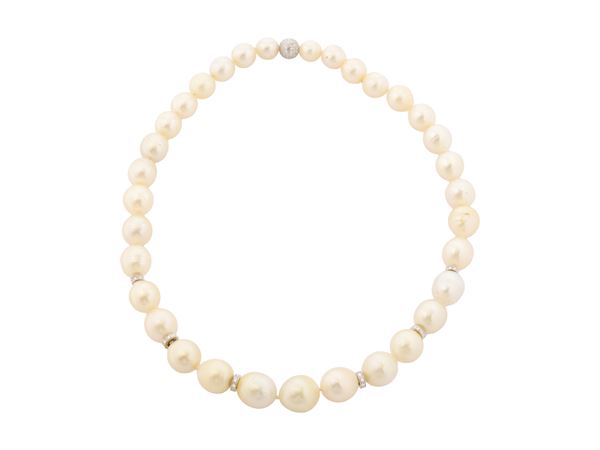 Single strand of white Australian pearls, 18Kt white gold and diamonds necklace